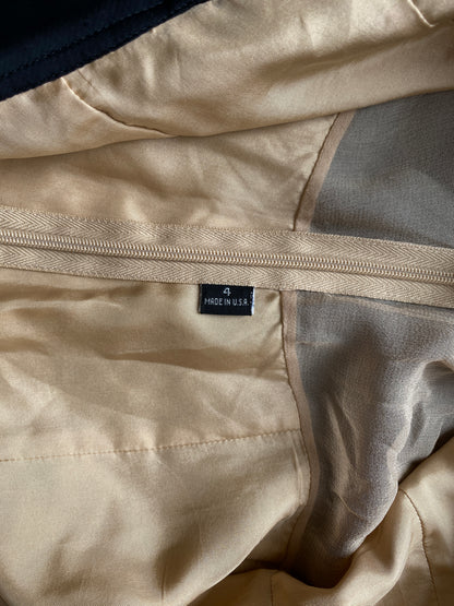 Close-up of the beige interior of the Isabel Toledo Sculptural Taffeta Dress. 
