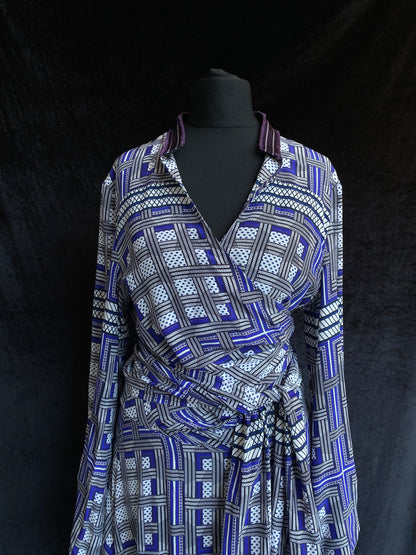 Amanda Wakeley Silk Wrap Dress geometric print in shades of blue black background.