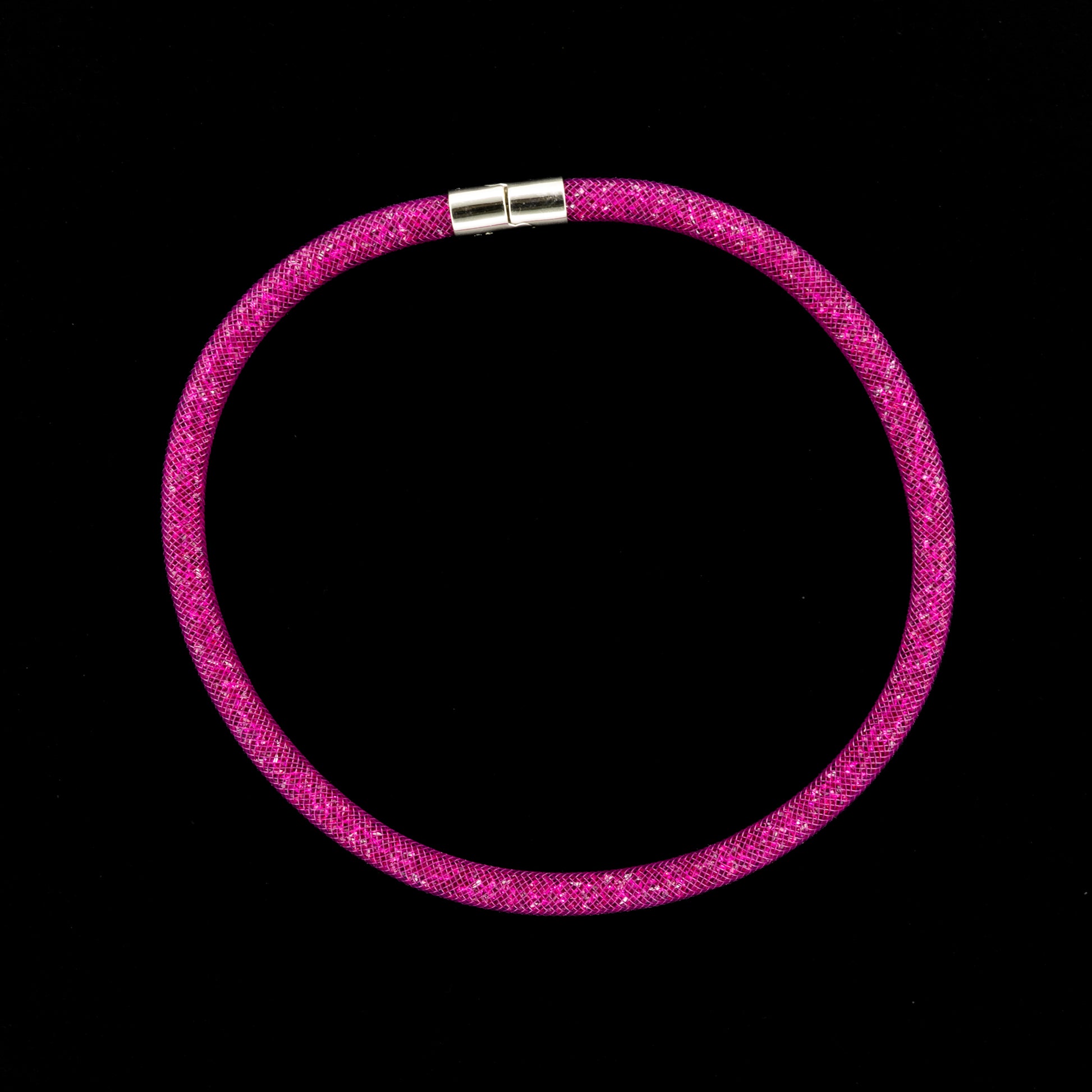 Swarovski Stardust Double Bracelet/Necklace with a silver clasp on a black background.