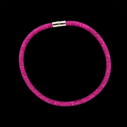 Swarovski Stardust Double Bracelet/Necklace with a silver clasp on a black background.