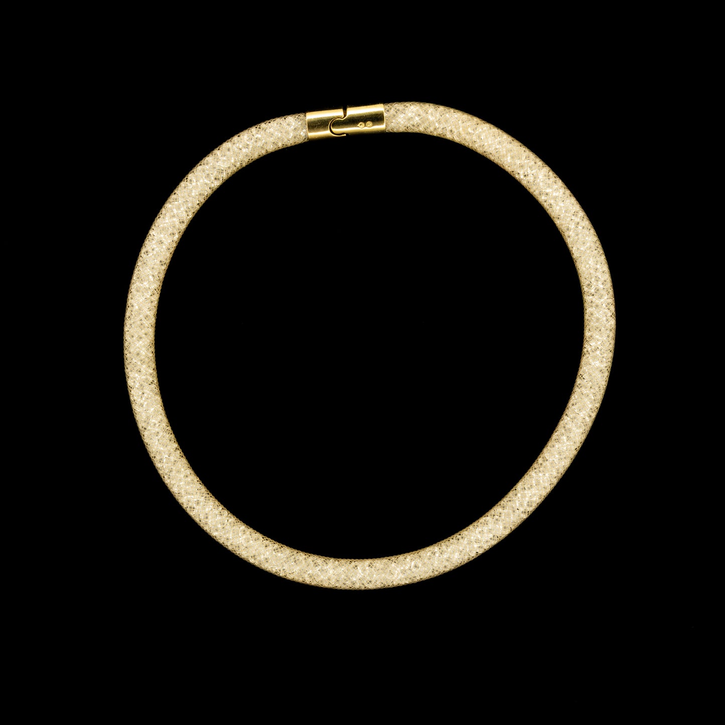 Swarovski Stardust Beige/Gold Double Bracelet/Necklace bracelet on a black background.